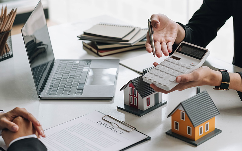 CKS valuer calculating property values for Singapore accreditation.